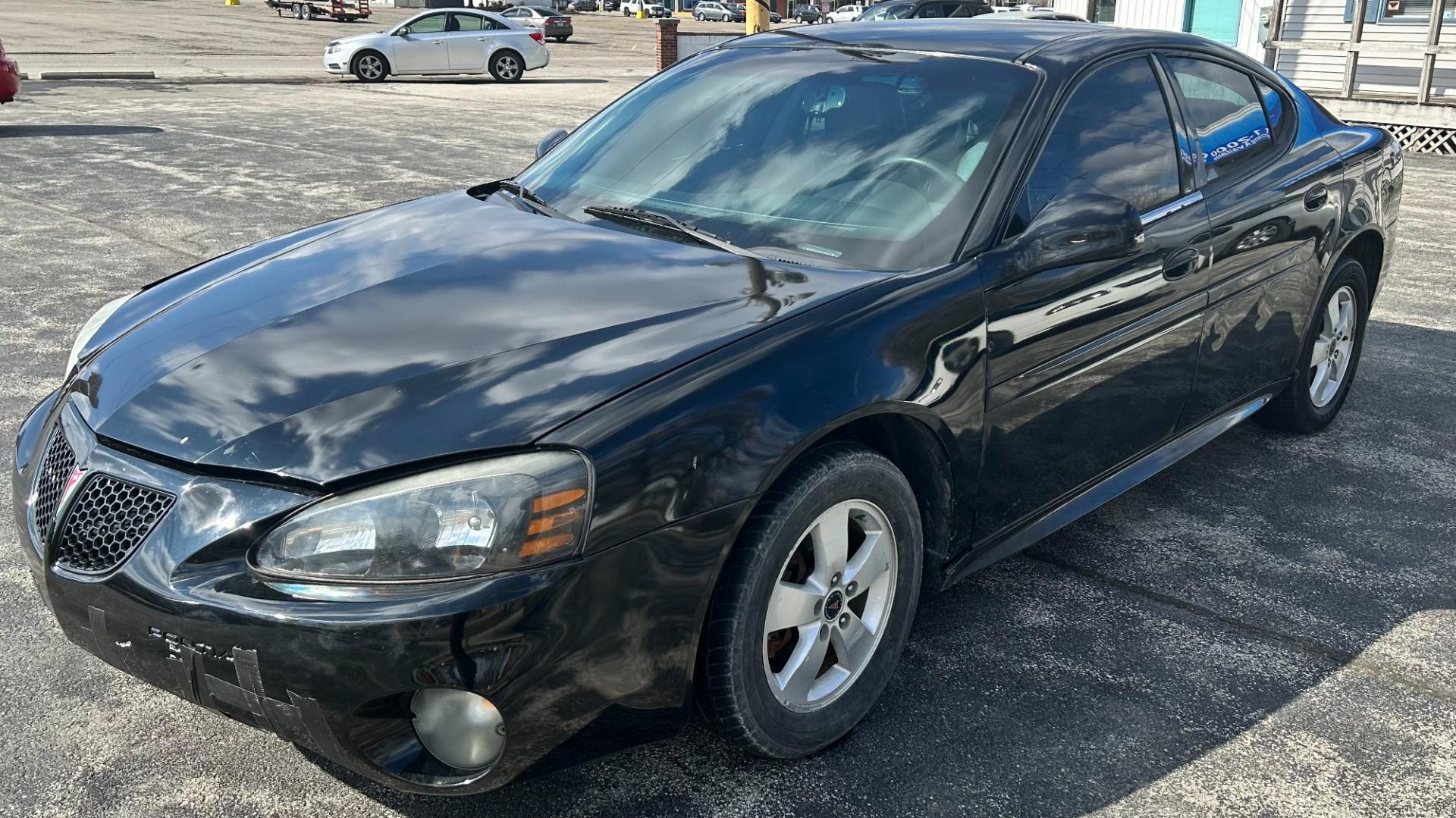 2006 Black /BLACK Pontiac Grand Prix Base (2G2WP552361) with an 3.8L V6 OHV 12V engine, 4-Speed Automatic Overdrive transmission, located at 2710A Westlane Rd., Indianapolis, IN, 46268, (317) 291-2000, 39.885670, -86.208160 - Photo#1